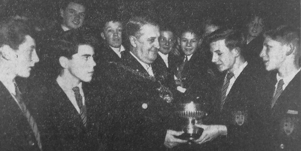 Mayor of Wallasey (Ald. H. Bedlington) presents A. G. Nicholson Challenge Cup.

Left to right: R. J. Chapman, J. G. Melia, the Mayor, H. C. Wheelwright (receiving the cup), and R. S. Voller.