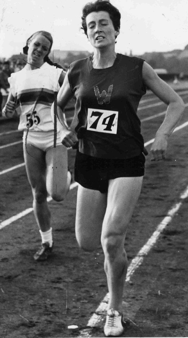Barbara Banks (Wallasey A.C.) Just beats Jill Simmons of Wirral A.C. in the women's 880 yards final of the Liverpool Parks amateur athletic championships held at Wavertree Playground on 23/7/1969.